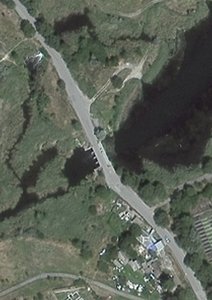 На содержание плотины через реку Грушевка и земляной защитной дамбы мкр